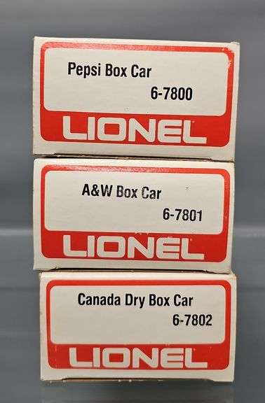 Three Lionel MPC era O box cars in original boxes