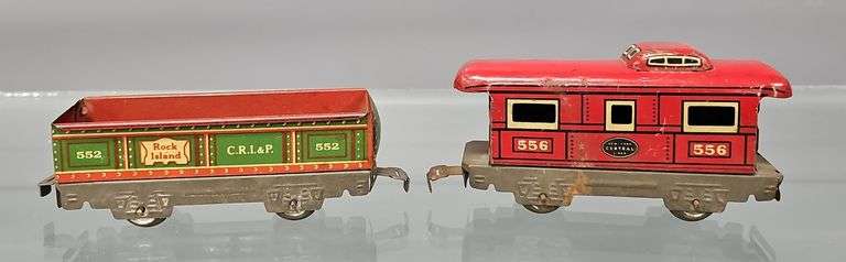 Two Marx O gauge freight cars with unpainted frames