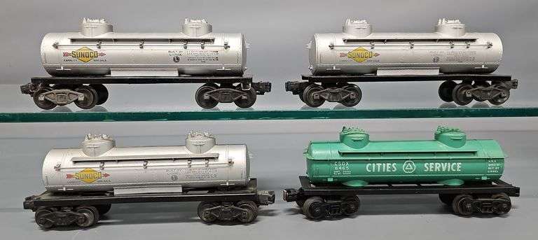 Four Lionel postwar O 6465 Tank Cars with three original boxes