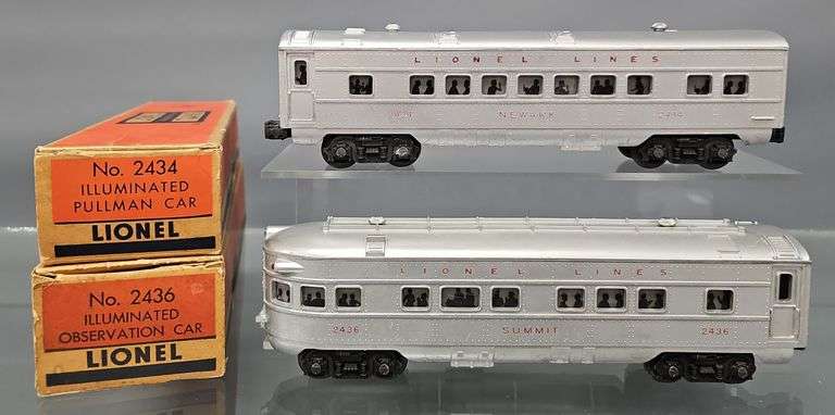 Two Lionel postwar O passenger cars in original boxes