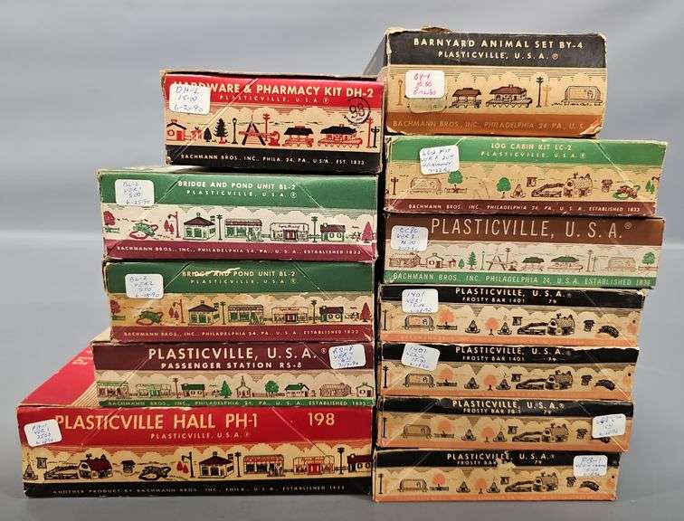 Twelve Bachmann Plasticville USA Building Kits in original boxes
