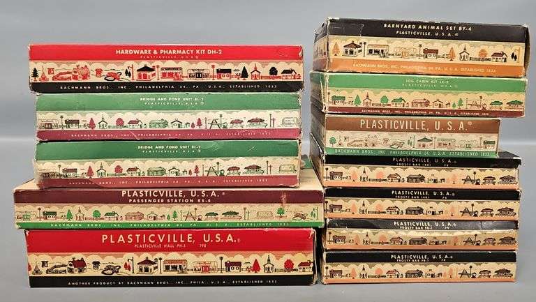 Twelve Bachmann Plasticville USA Building Kits in original boxes