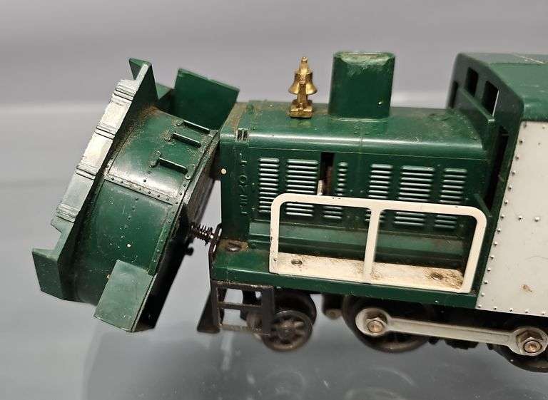 Group of Mixed Lionel prewar and postwar O gauge trains