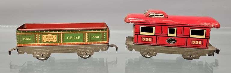 Two Marx O gauge freight cars with unpainted frames