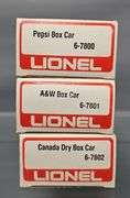 Three Lionel MPC era O box cars in original boxes