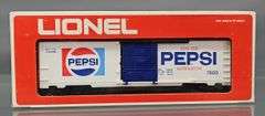 Three Lionel MPC era O box cars in original boxes