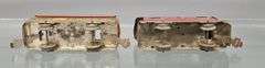 Two Marx O gauge freight cars with unpainted frames