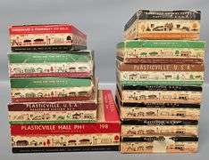 Twelve Bachmann Plasticville USA Building Kits in original boxes