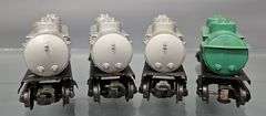 Four Lionel postwar O 6465 Tank Cars with three original boxes