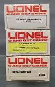 Three Lionel MPC era O freight cars in original boxes