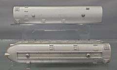 Two Lionel postwar O passenger cars in original boxes