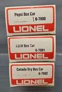 Three Lionel MPC era O box cars in original boxes