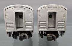 Two Lionel postwar O passenger cars in original boxes