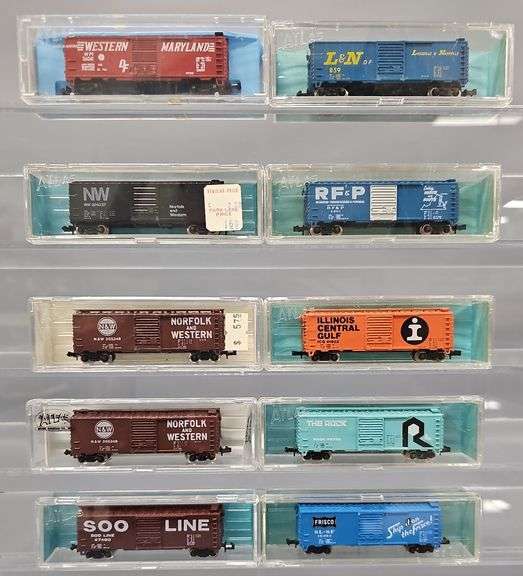 Ten Atlas N Scale Box Cars in Clear Cases
