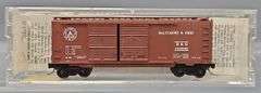Ten Kadee Micro-Trains N Scale Box cars in Clear Cases