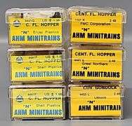Six AHM Minitrains N Scale Centerflow Hoppers in Clear Cases
