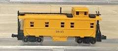Ten Atlas N Scale Cabooses in Clear Cases