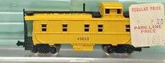 Ten Atlas N Scale Cabooses in Clear Cases