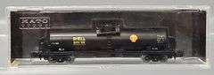 Four Kato and one Atlas N Scale Tank Cars in Clear Cases