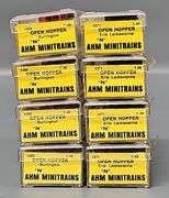 Eight AHM Minitrains N Scale Open Hopper Cars in Clear Cases