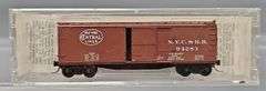 Ten Kadee Micro-Trains N Scale Box cars in Clear Cases