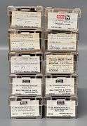 Ten Kadee Micro-Trains N Scale Box cars in Clear Cases