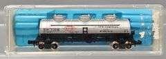 Four Kato and one Atlas N Scale Tank Cars in Clear Cases