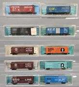 Ten Atlas N Scale Box Cars in Clear Cases