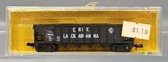 Eight AHM Minitrains N Scale Open Hopper Cars in Clear Cases