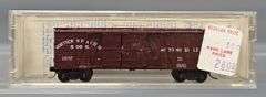 Ten Kadee Micro-Trains N Scale Box cars in Clear Cases