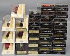 Twenty-seven Bachmann N Scale Freight Cars with one Diesel Locomotive in Clear Cases