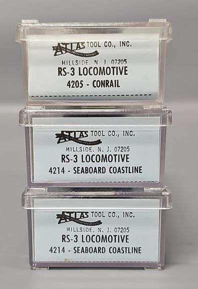 Three Atlas N Scale RS-3 Diesel Locomotives in clear cases