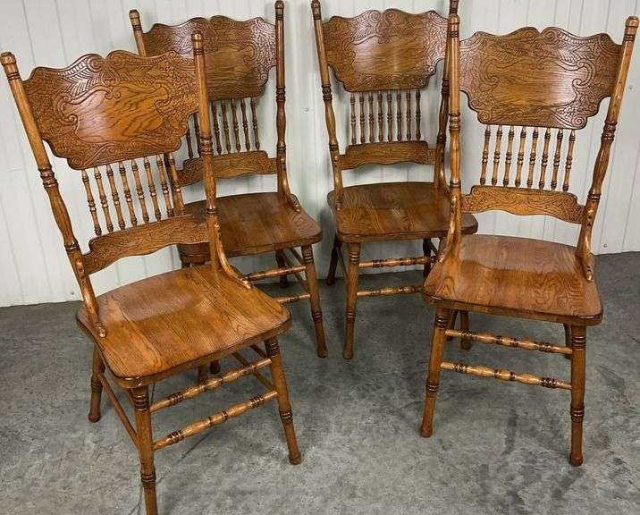 Set of 4 Oak Pressed Back Dining Chairs with Carved Backs ca 1900-1920 image