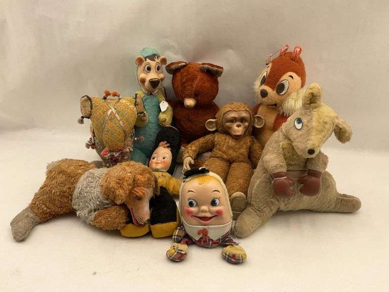 Collection of Vintage Plush Stuffed Animals and Dolls image