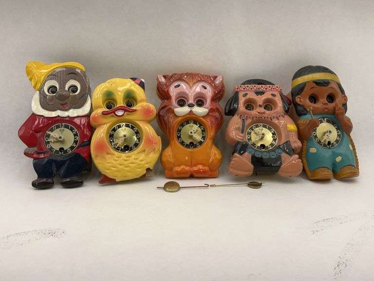 Lot of 5 figural wall clocks image