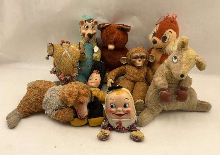 Collection of Vintage Plush Stuffed Animals and Dolls image