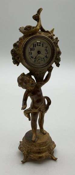 Cherub Holding Clock image
