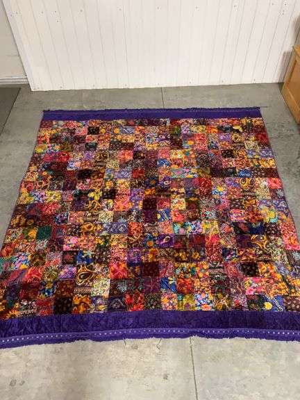 Colorful Patchwork Quilt with Tassels image