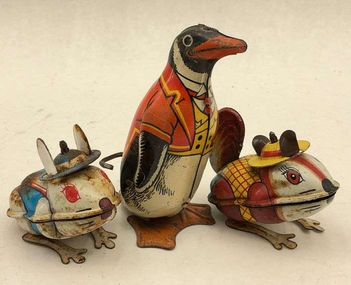 Lot of Three Collectible Tin Wind-Up Toys: Chein & Yone Rabbit, Squirrel and Penguin image