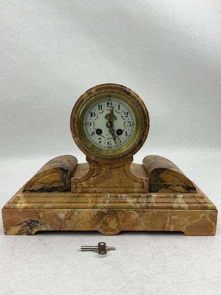 Antique Marble Mantel Clock with Scrollwork image