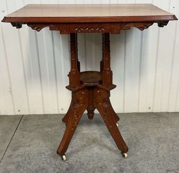 Victorian Eastlake Walnut Parlor Table with Original Casters image