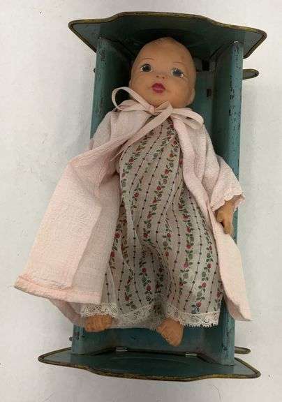 Rockabye Cradle Babe Musical Wind-Up Doll Crib with Doll image