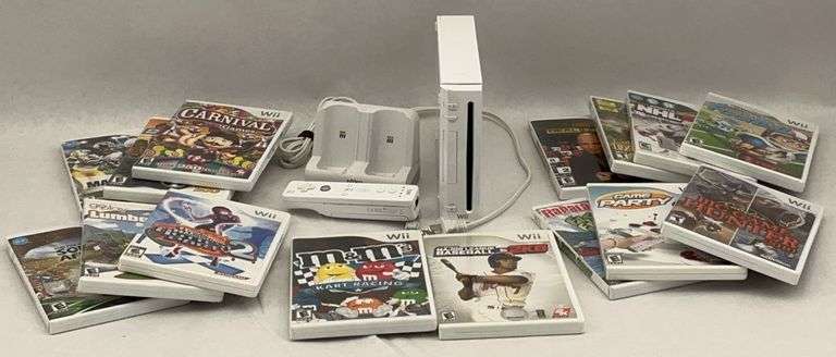 Nintendo Wii Console with Games, Dock, and Controller image