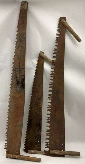 Collection of Three Rustic Crosscut Saws image