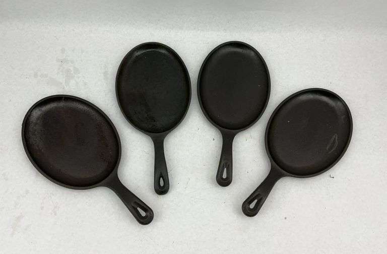 Set of Lodge and Tomlinson Cast Iron Pans - Four Pieces image