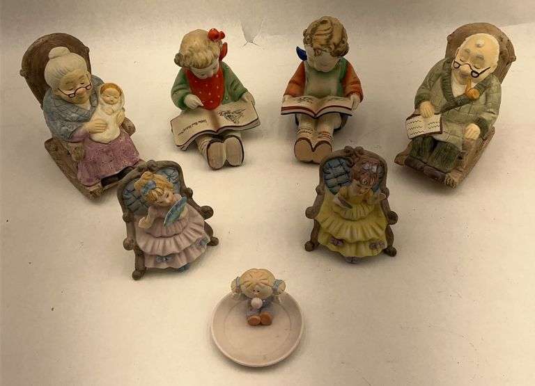 Collection of 7 Porcelain Figurines - Grandparents, Children, and Angels image