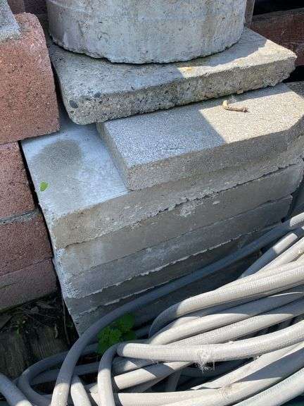 Mixed Lot of Building Materials: Bricks, Concrete, Rock