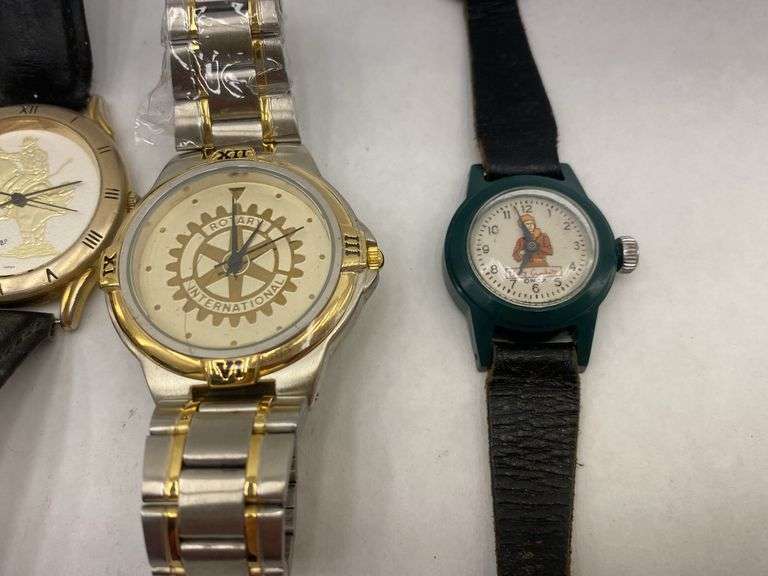 Lot of Five Assorted Wristwatches, including FedEx and Rotary International