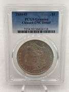1884-O PCGS Genuine Cleaned-UNC Detail Silver Dollar