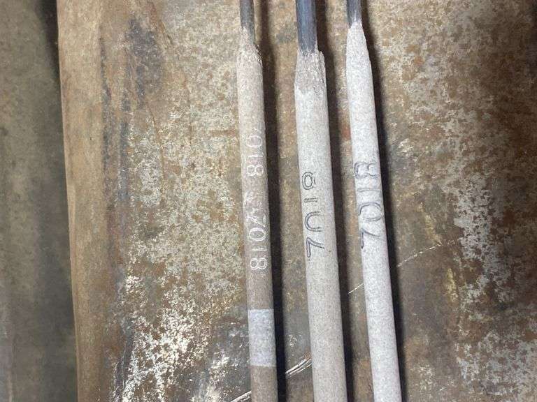 3 boxes of 7018 Welding Rods in Metal Containers
